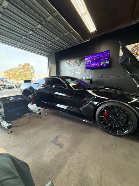 Black Chevrolet Corvette C7 prepared for a dyno session inside the RPM Logic shop