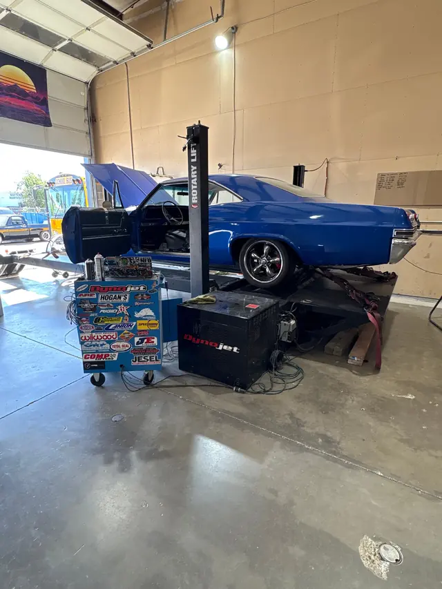 Blue Chevrolet Impala SS on a Dynojet for dyno calibration